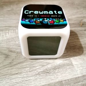 Among US Réveil matin